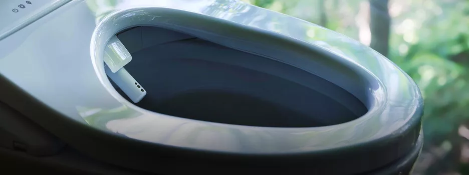 close up image of TOTO WASHLET with the seat open